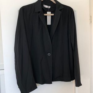Black, one-button long sleeve blouse